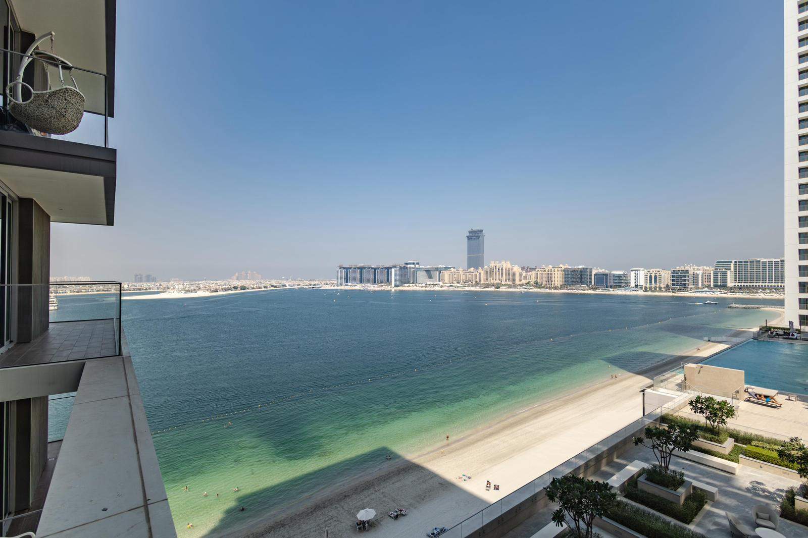 Luxusný 4KK apartmán s výhľadom na Palm Jumeirah v EMAAR Beachfront